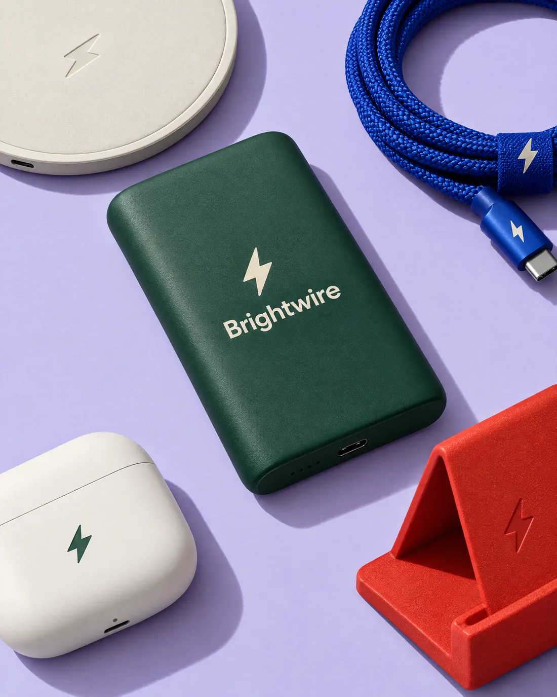 Brightwire-branded power bank, braided charging cable, wireless charger, earbuds case and phone stand